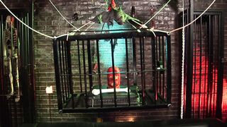 Busty vixen in latex sucks and fucks two guys in a dungeon