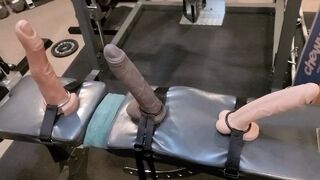 Sissy SaddleStrap squats with three big Mr Hankeys toys