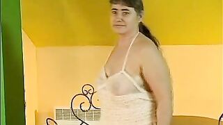 Busty Mature Plays with Her Toy