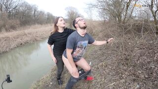 Hiding from cars while fucking with a strap-on