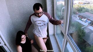 The guy looks at the neighbors while the girl licks his ass