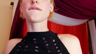 Hot blonde with big boobs in black lingerie and high heels