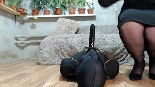 Mistress teases a slave