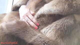 little bitch with long labia pussy lips masturbates in a fur coat on the balcony