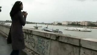 Lara giving a striptease