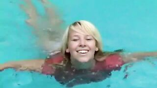 Big titted girl in a pool