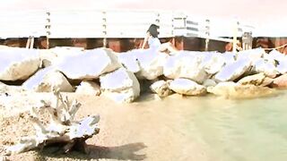 Big titted teen at the seaside