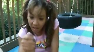 Petite Asian chick Keanni Lei is jerking off this white dick