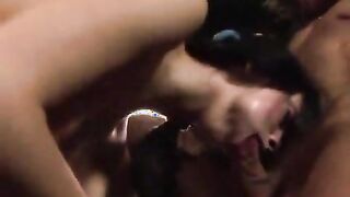 Comely brunette chick gives deep throat and gets fucked doggy in a threesome