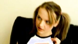 Pig-tailed amateur British teenage honey in braces Britney Candy stripping erotically on the couch