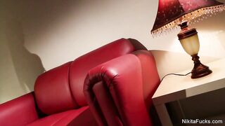 Nikita spreads her pussy