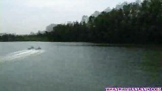 Lesbian licked and fingered her clit on boat