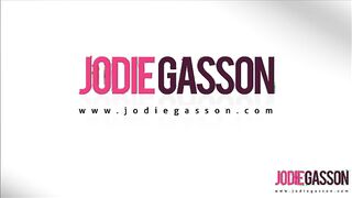 Jodie in black top and denim shorts