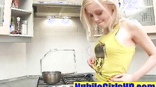 Sexy teen posing in the kitchen